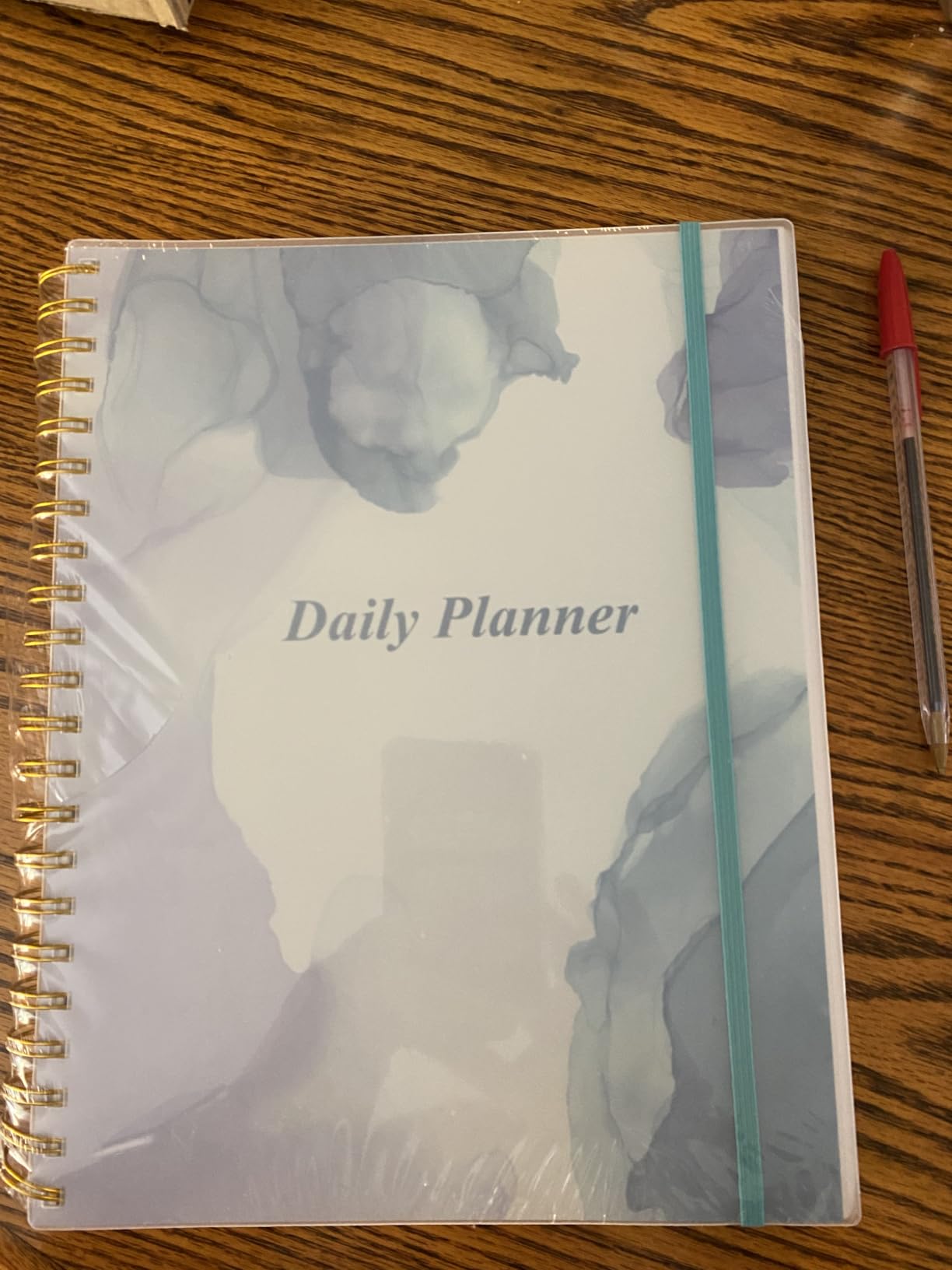 Daily Planner Undated - A5 To Do List Notebook Hourly Schedules, Spiral Appointment Planner for Women and Men, PVC Hardcover, Inner Pocket, Elastic Closure, 5.8