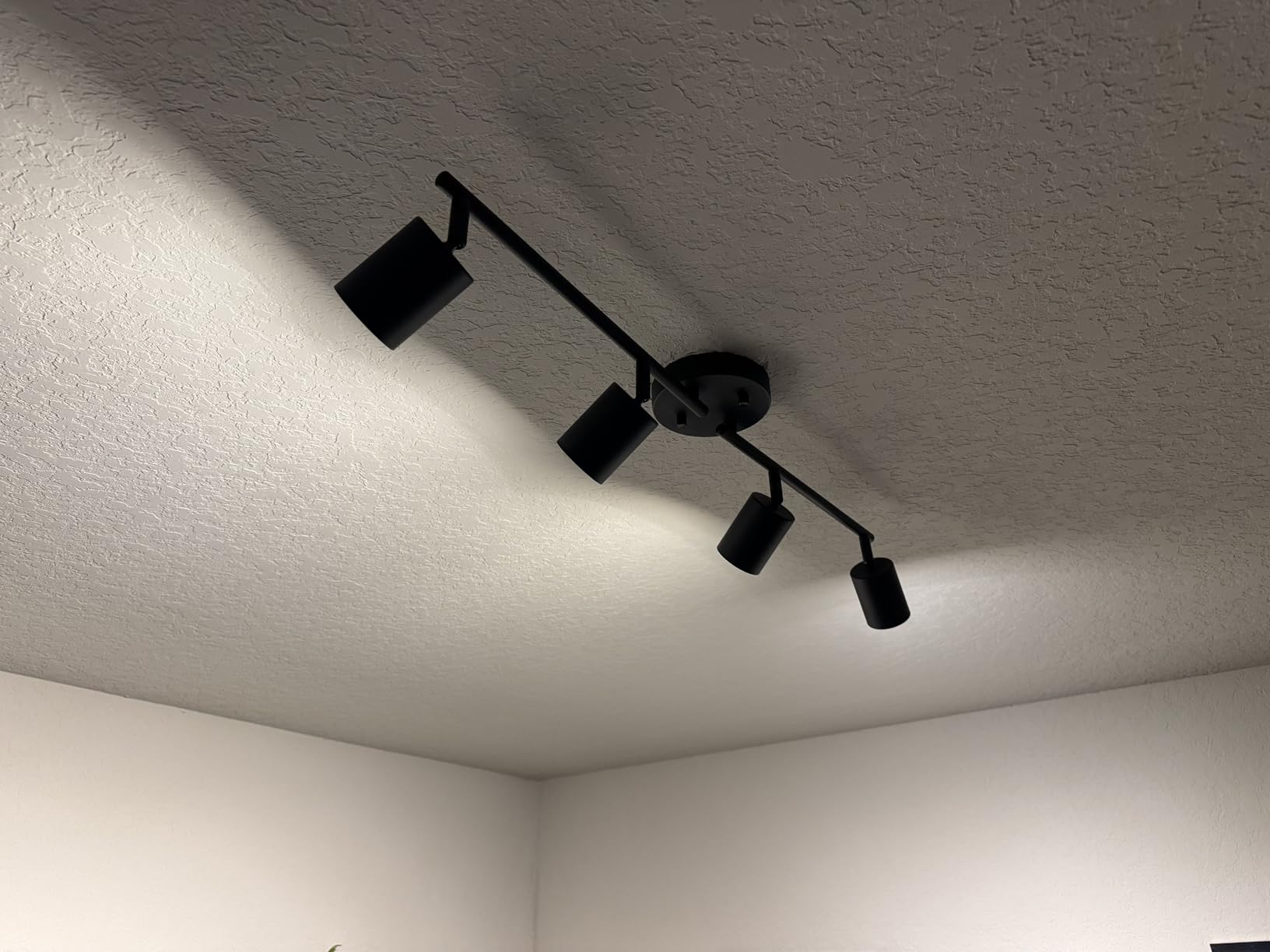 BoostArea LED 4 Light Track Lighting Kit, Black 4 Way Ceiling Spot Lighting, Flexibly Rotatable Light Head for Kitchen, Living Room, Bedroom, Bulb Not Included customer photo 1