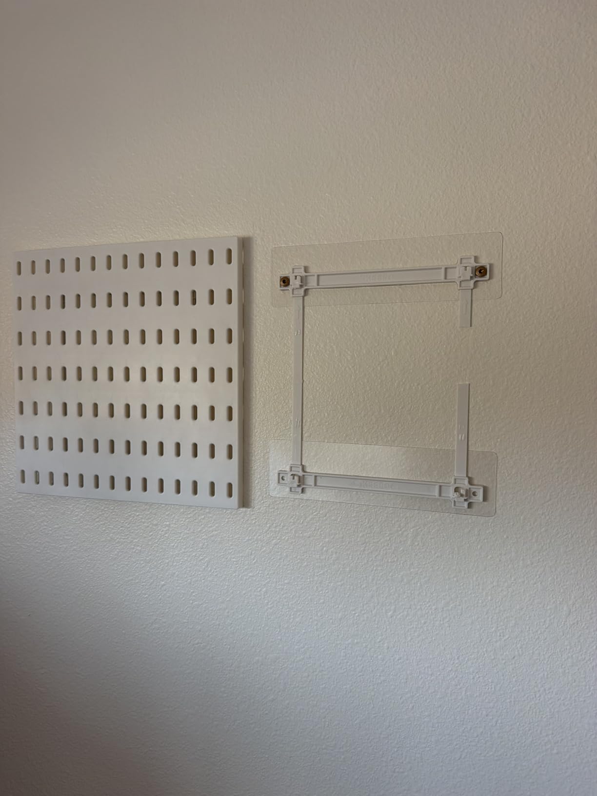 Keepo Peg Board Wall Organizer – Plastic Pegboard Panels, Modular Peg Board Storage System for Home Office, Craft Room, Gaming Setup (White, 33″×22″) customer photo 1